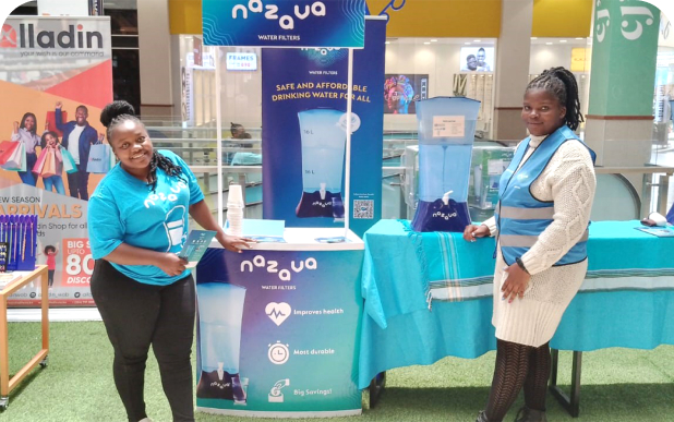 Wela Utami from Nazava Water Filters receiving certificate of appreciation from AKKOPSI